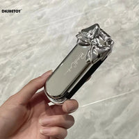 Mini Escova de Cabelo Dobrável com Espelho – Edição Luxo Cromada