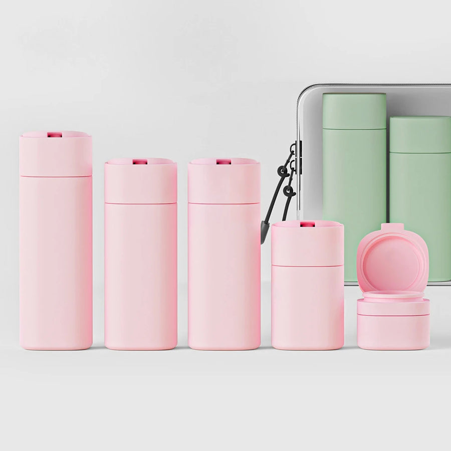 Kit de Viagem 4 em 1 Recarregável – Garrafa Compacta Anti-Vazamento (Com Spray, Bomba e Dispensador)