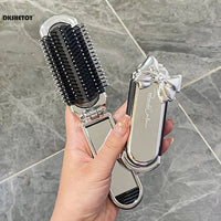 Mini Escova de Cabelo Dobrável com Espelho – Edição Luxo Cromada